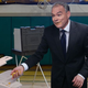Image for article titled Tim Kaine Stuffs Handful Of Goldfish Crackers In Ballot Scanner